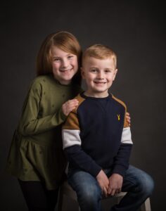 Brother and Sister hugging during a child photo shoot in Whitchurch Hampshire