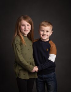 Brother and Sister holding hands during a child photo shoot in Whitchurch Hampshire