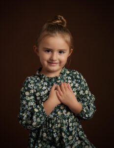 Four Year Old Girl posing during her Fine Art Studio Photo Shoot in Whitchurch Hampshire