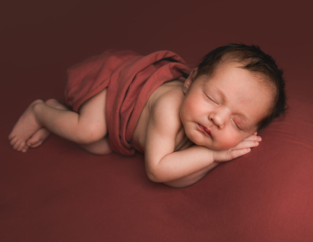 baby girl in side lay pose.  My top 5 Newborn Poses
